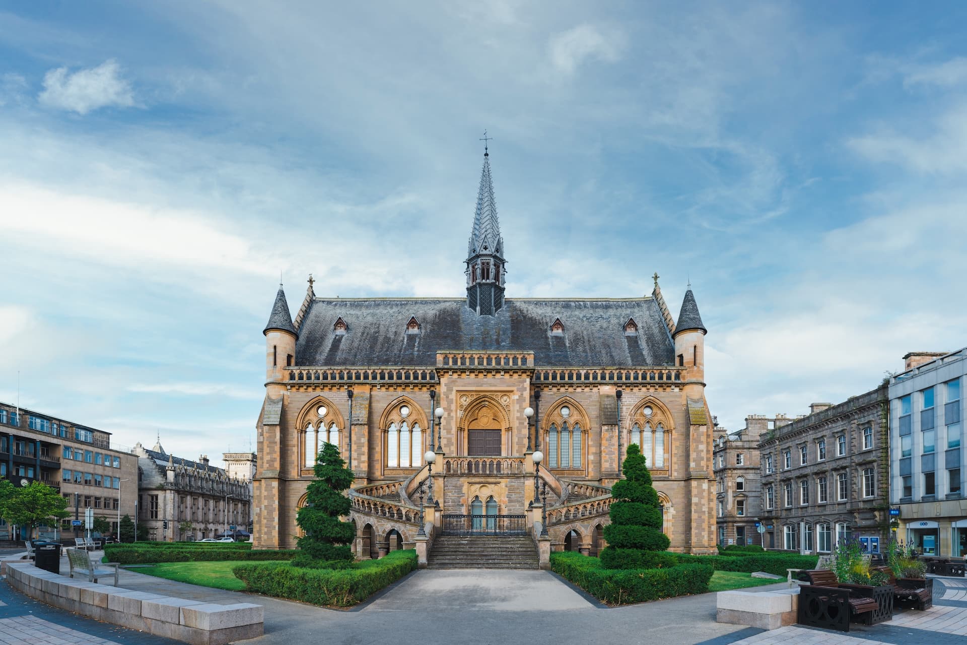 McManus Art Gallery and Museum in Dundee with symmetrical stone staircases and spire.