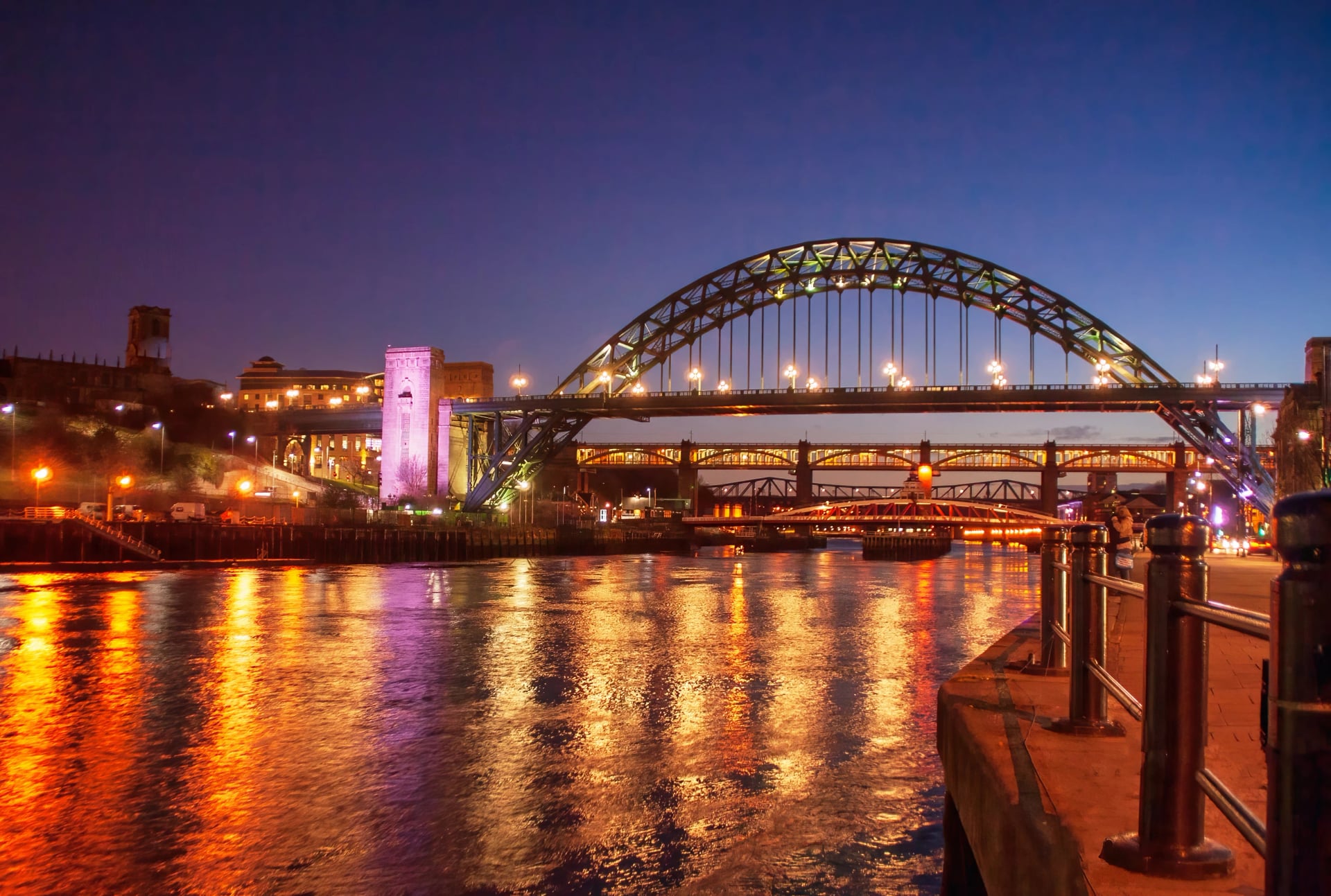 Reflections on the river tyne with the bridges in the background.